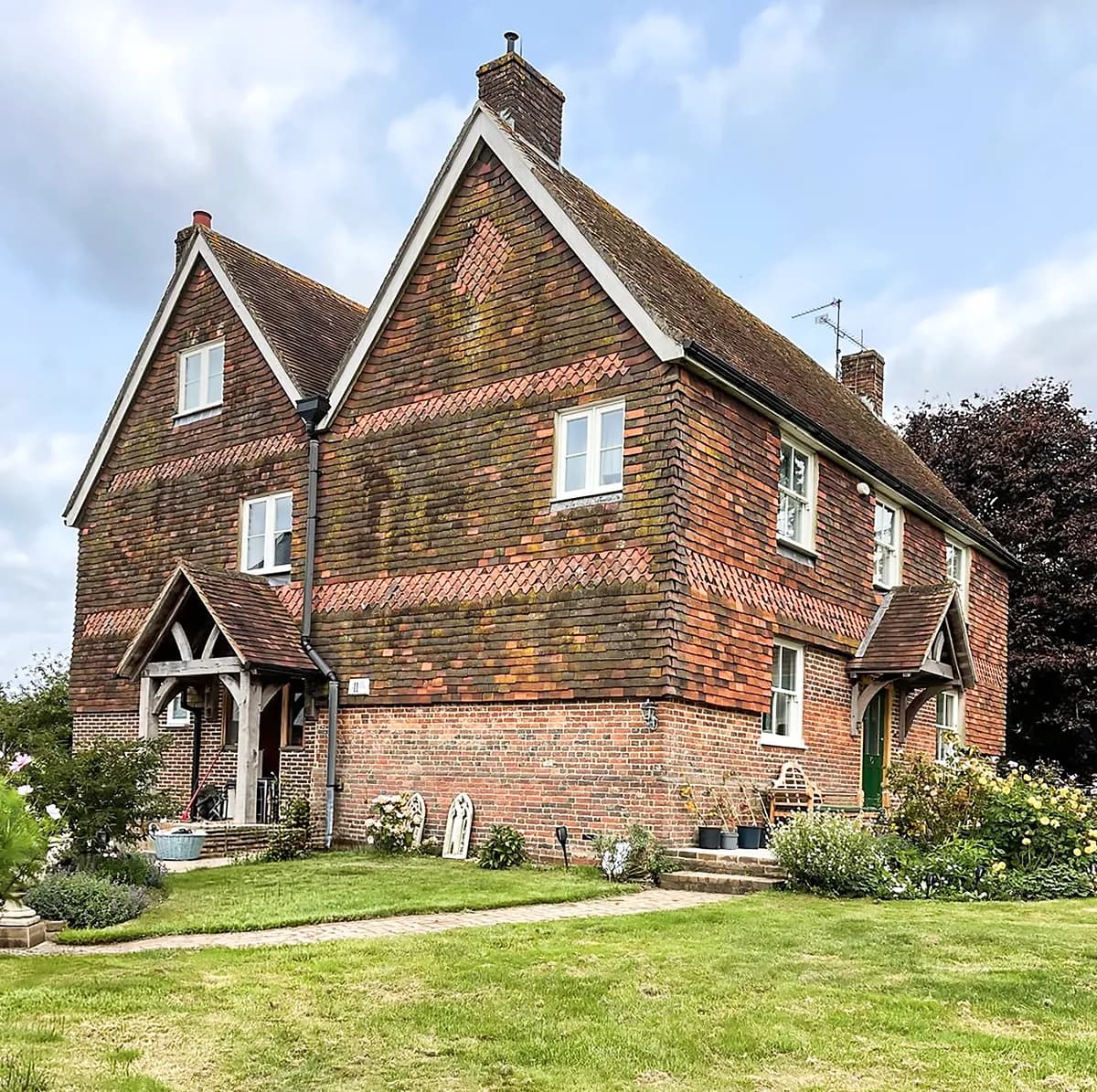 House exterior with flint walling