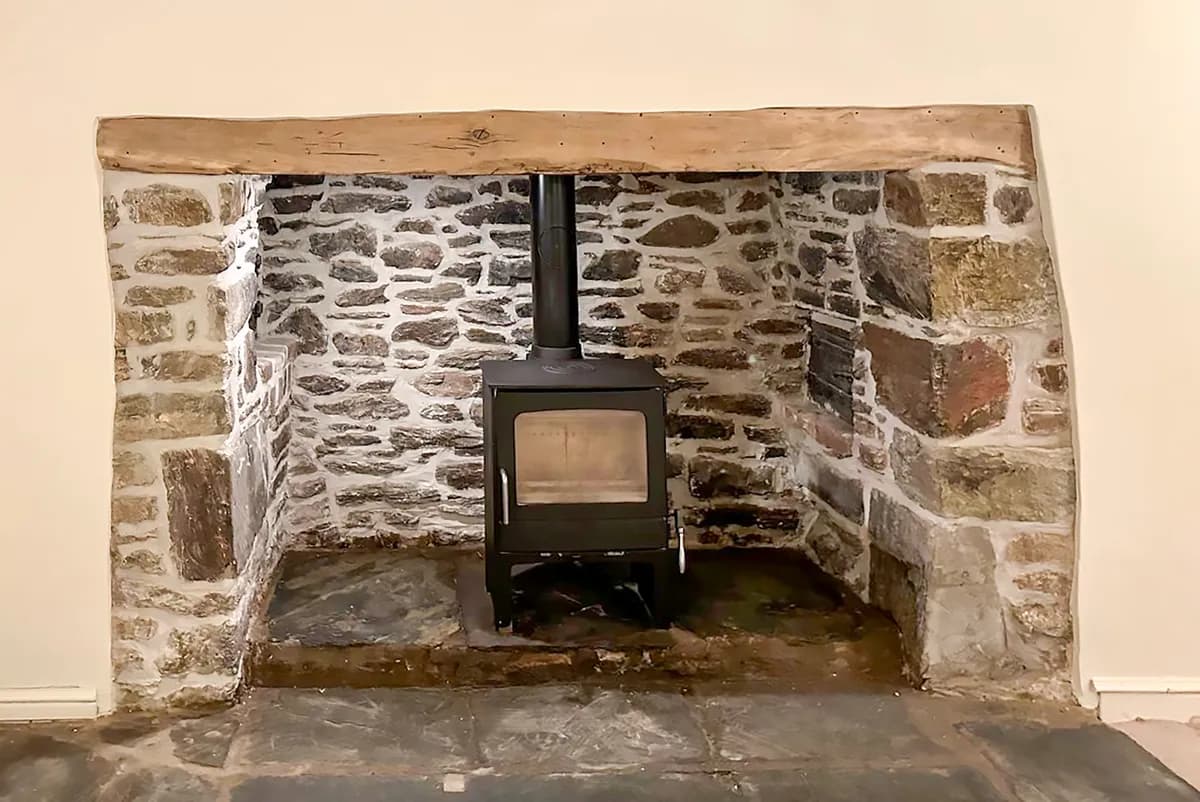 Restored inglenook fireplace